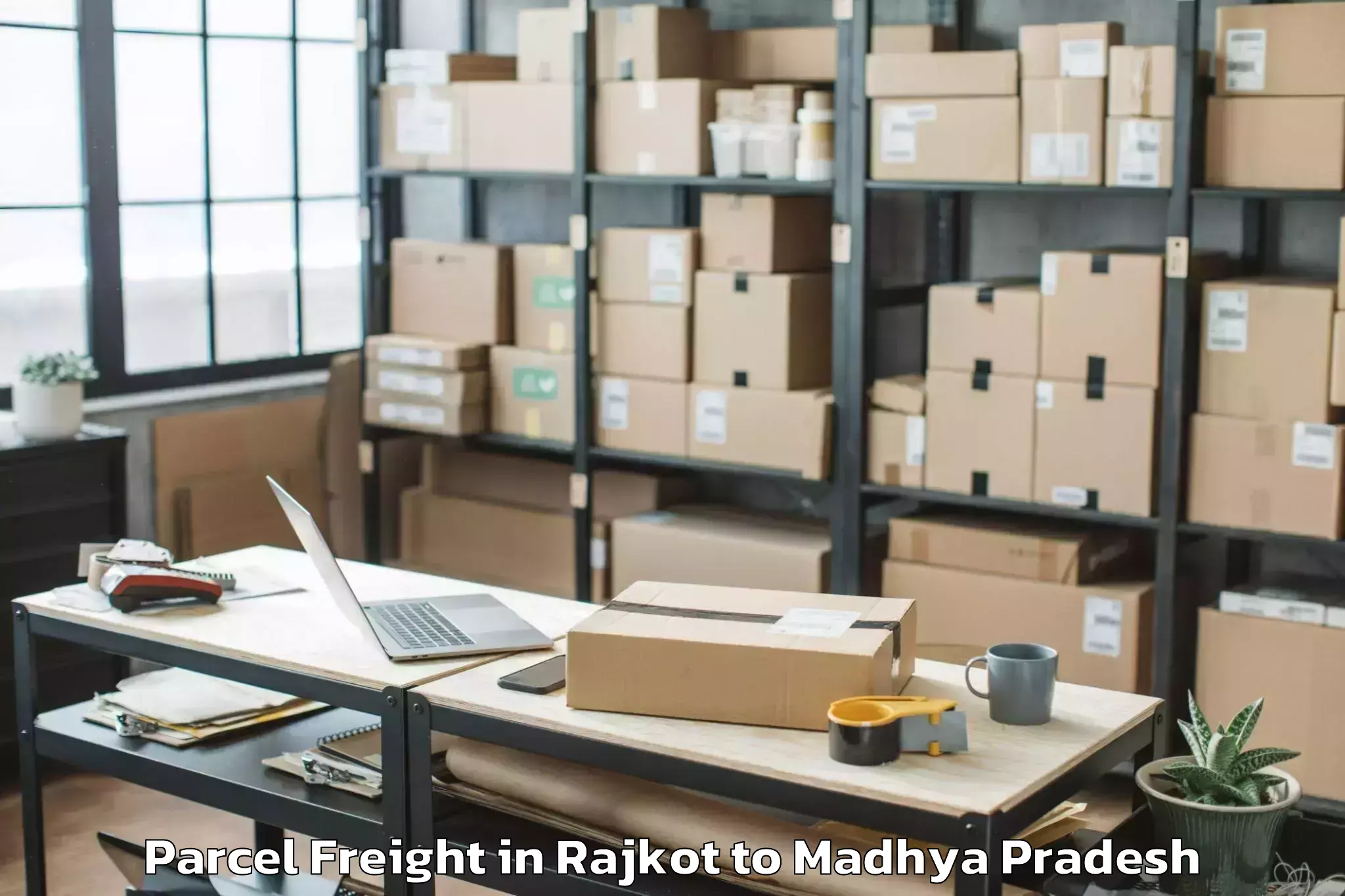 Book Rajkot to Anjad Parcel Freight